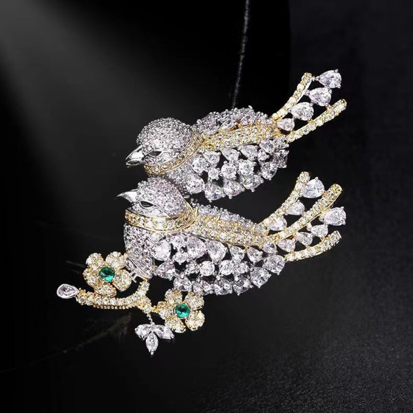Broche d'amoureux en zircon