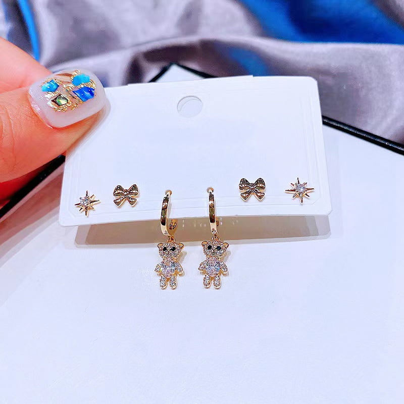Lot de 6 boucles d'oreilles en forme d'ours en zircon avec nœud étoile.